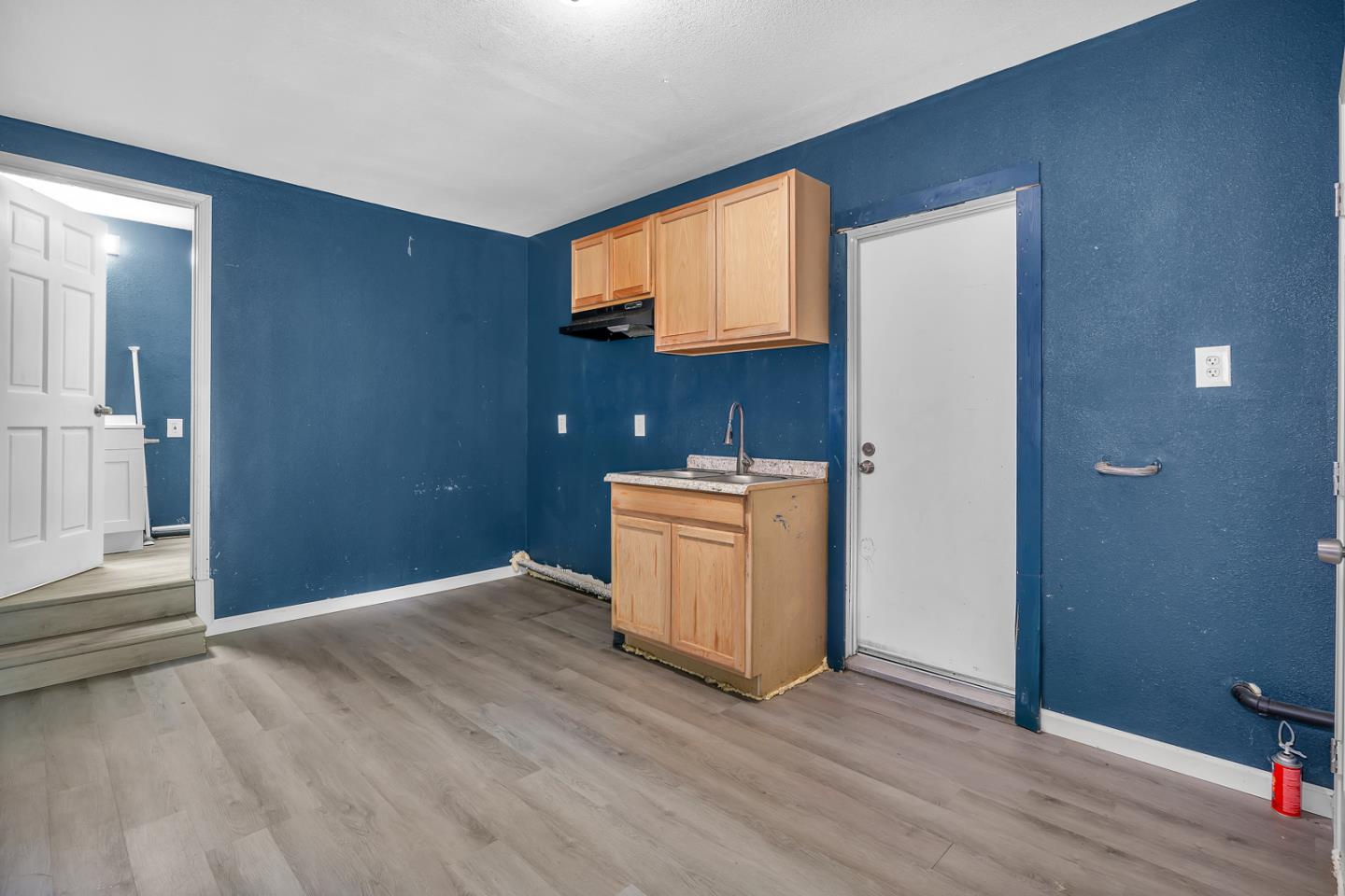 2965 Dunn Road Merced, CA 95340 - Photo 54 of 68 wooden floor in an empty room and a window