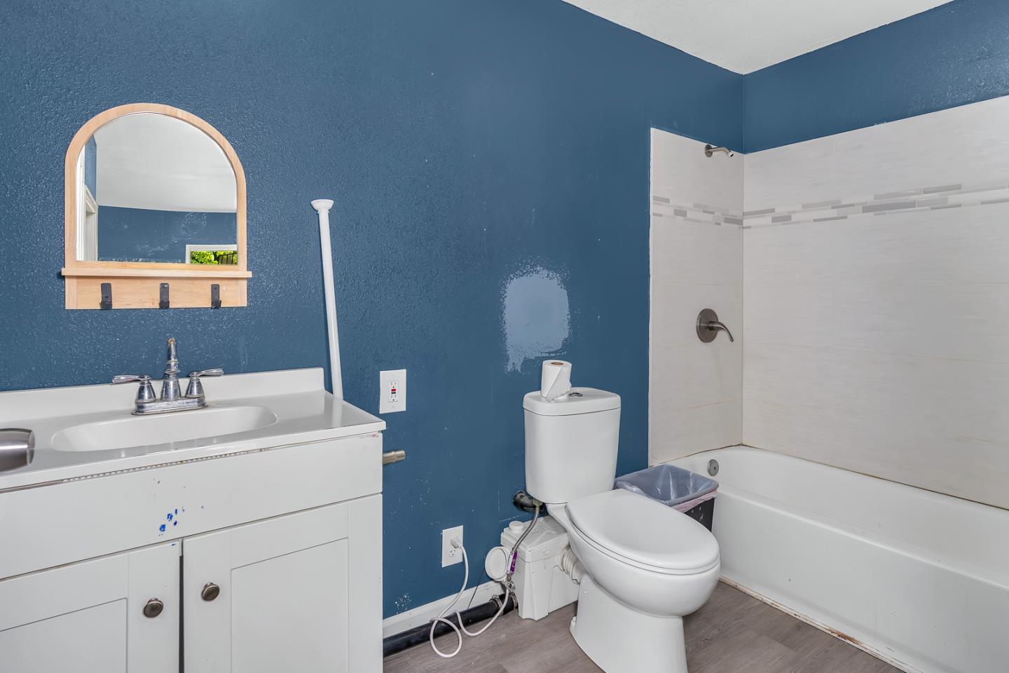 2965 Dunn Road Merced, CA 95340 - Photo 56 of 68 a bathroom with a toilet sink and mirror