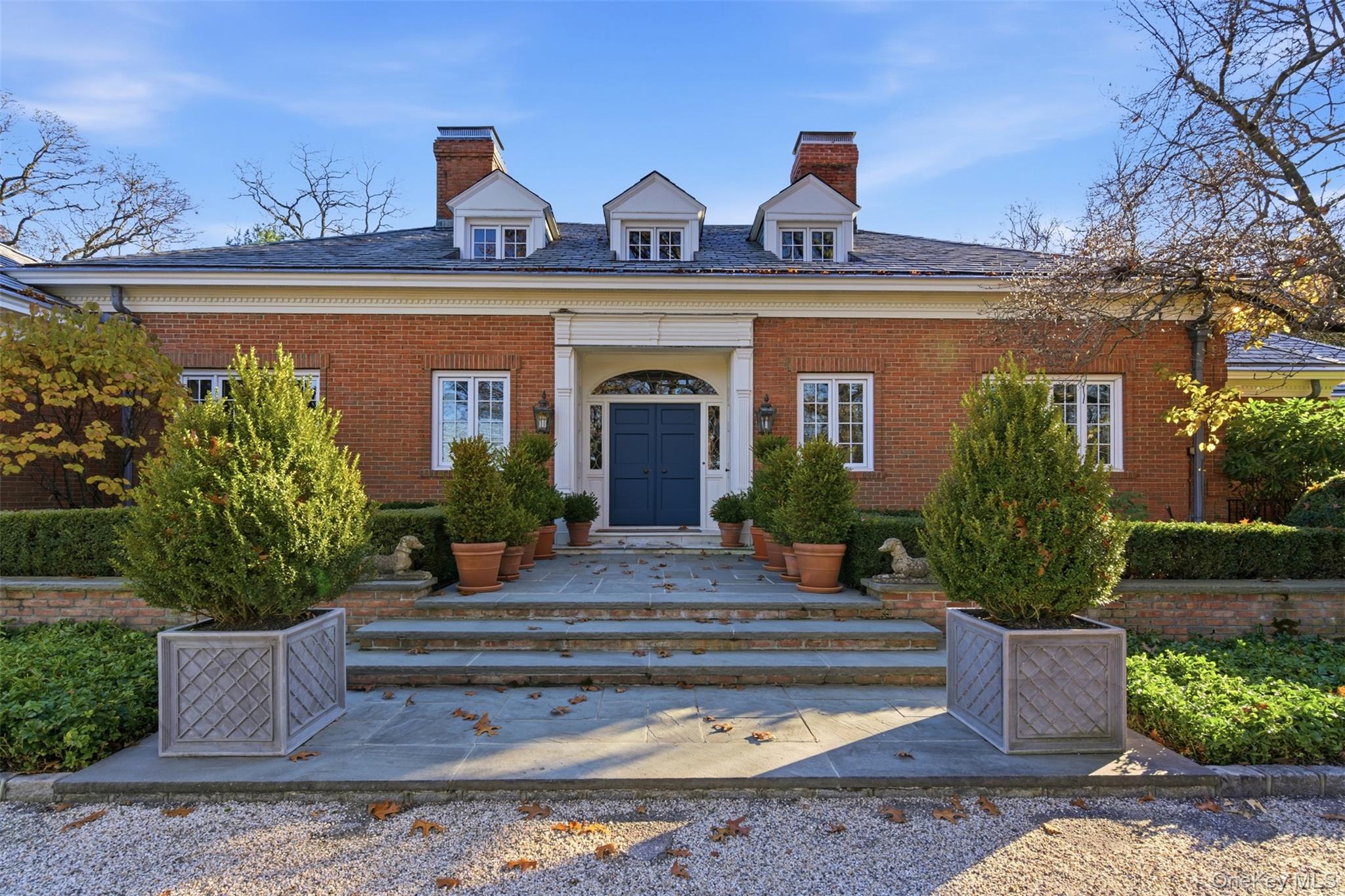 159 Factory Pond Road Mill Neck, NY 11560 - Photo 3 of 39 View of front of home featuring a gracious front entrance with parking.