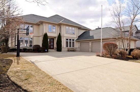 2087 Sheridan Road Buffalo Grove, IL 60089 - Photo 1 of 18 a view of a white house with a outdoor space