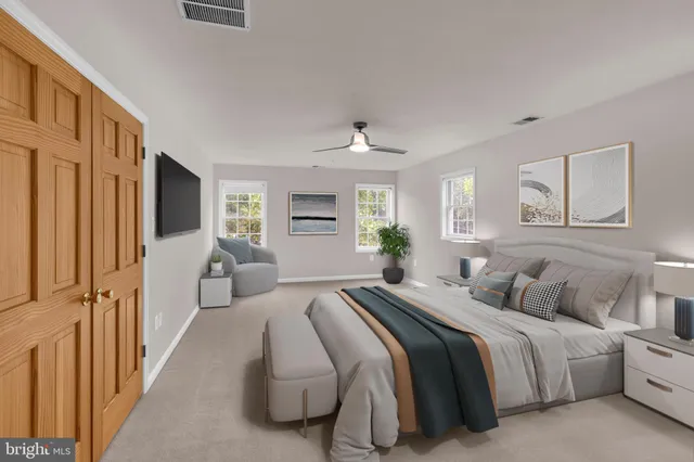 a view of an empty room and a window