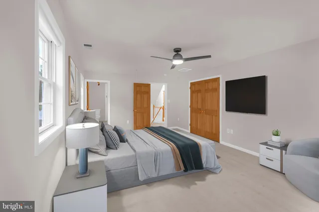 a bathroom with a bathtub and a sink