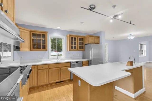 a living room with furniture fireplace and a table