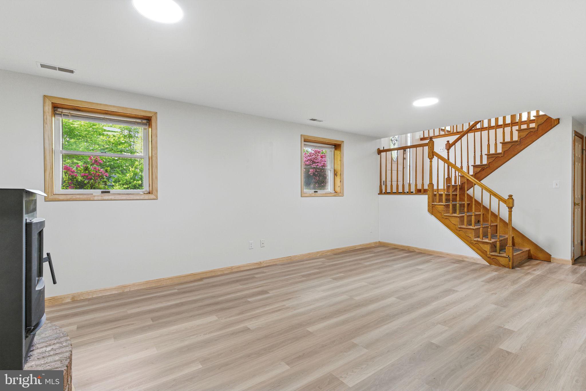 651 Silver Rock Road Lusby, MD 20657 - Photo 12 of 35 Lower level rec room area