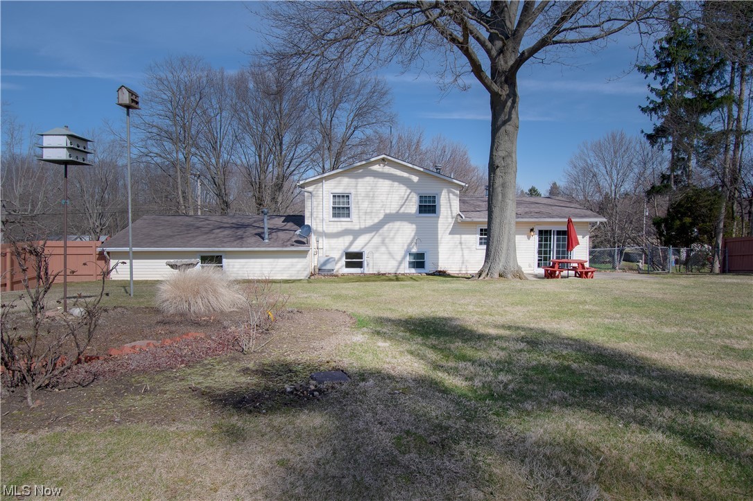 3142 Farmdale Road Akron, OH 44312 - Photo 3 of 22 The large fenced-in backyard is perfect for kids and pets to play safely.