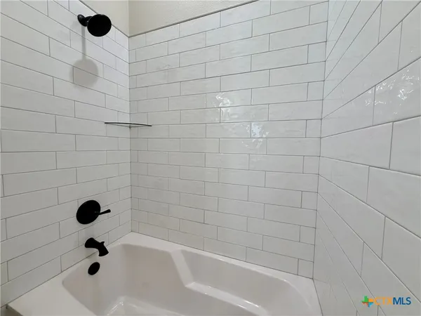 a bathroom with a bathtub