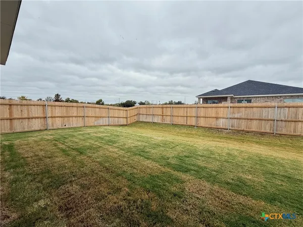 a view of outdoor space and yard