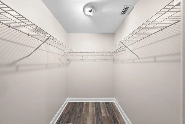 a view of a room with racks on the wall