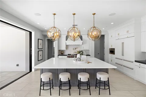 a view of dining table and chairs