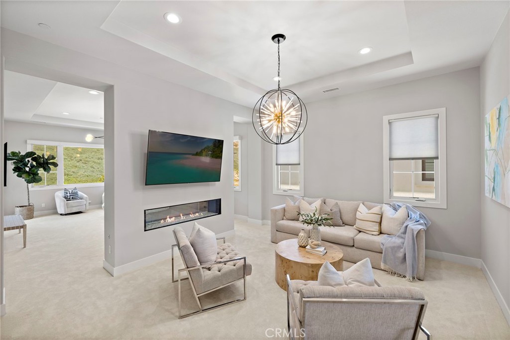 93 Interstellar Irvine, CA 92618 - Photo 29 of 54 primary suite retreat with fireplace