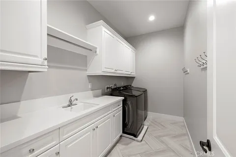 a view of backyard of house with seating space