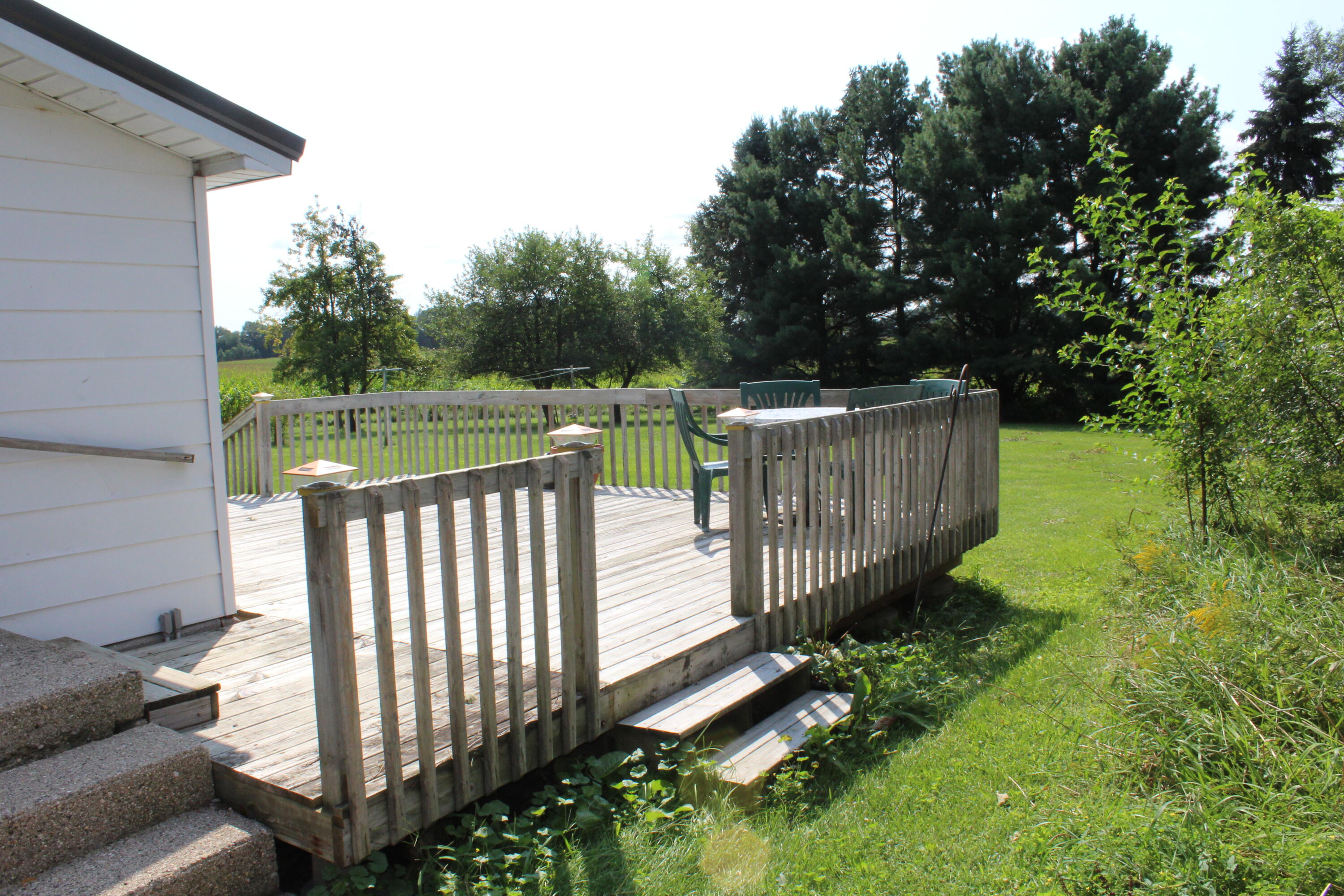 9401 Peck Road Greenville, MI 48838 - Photo 5 of 26 Newer Deck at the back of house