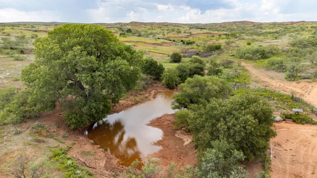 a view of a lake with mountains in the background
