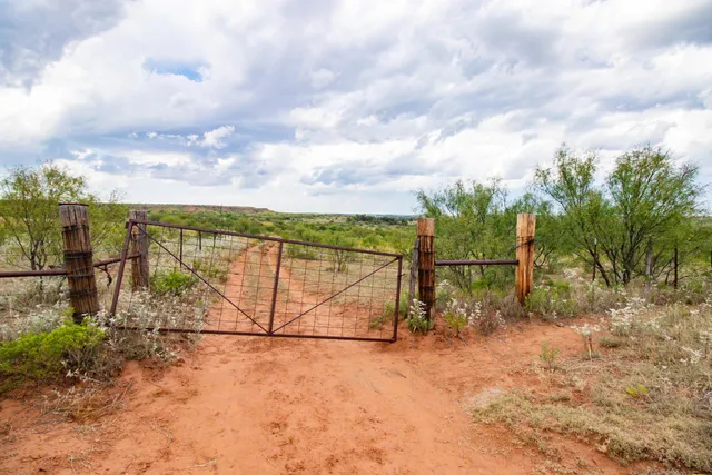 a view of a road with an ocean view