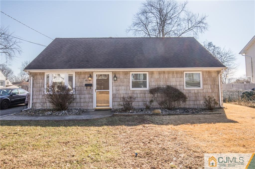 48 Caldwell Road Edison, NJ 08817 - Photo 1 of 24 a front view of a house with a yard