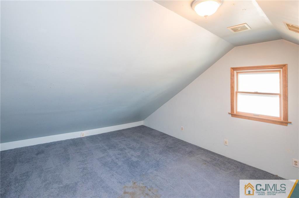 48 Caldwell Road Edison, NJ 08817 - Photo 11 of 24 an empty room with a window