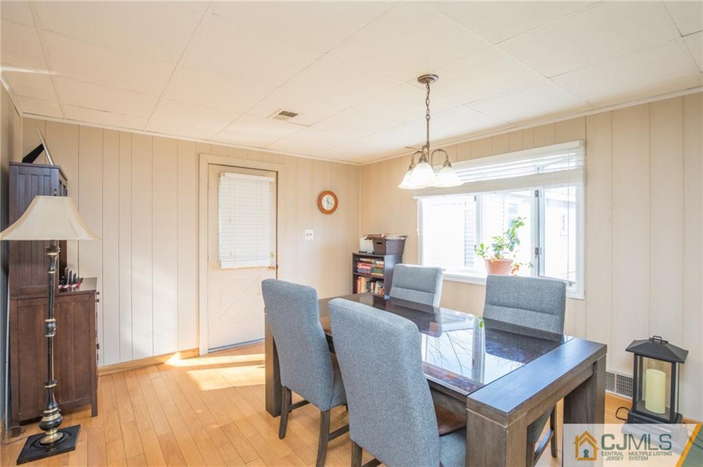 48 Caldwell Road Edison, NJ 08817 - Photo 19 of 24 a dining room with furniture and window