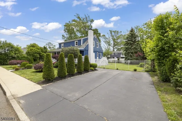 a view of a street with a houses