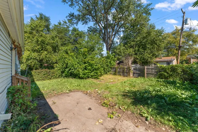 a view of a garden with pathway