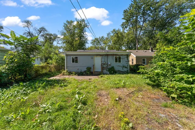a house view with a garden space
