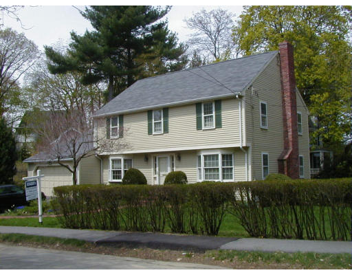 129 Pine Ridge Road Newton, MA 02468 - Photo 1 of 1 a front view of a house with a garden
