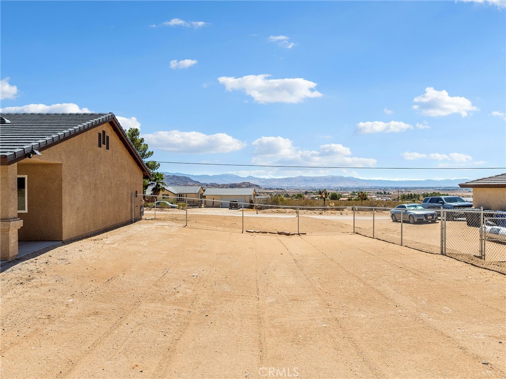 24162 Shoshone Road Apple Valley, CA 92307 - Photo 32 of 40 a view of an ocean and beach