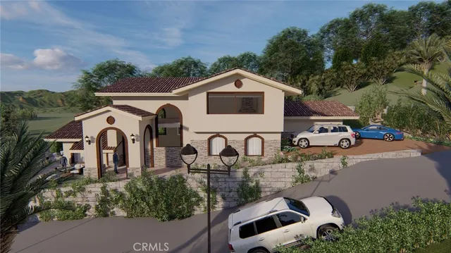 a view of a lush green hillside and houses