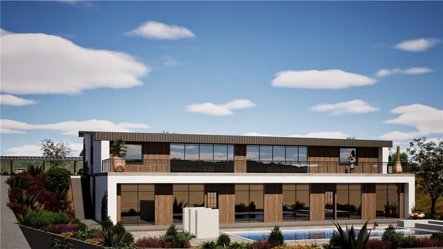 a front view of a building with street view