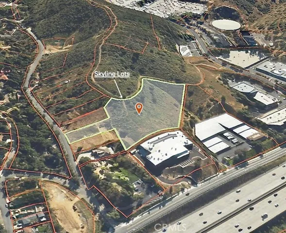 a aerial view of a house with a yard