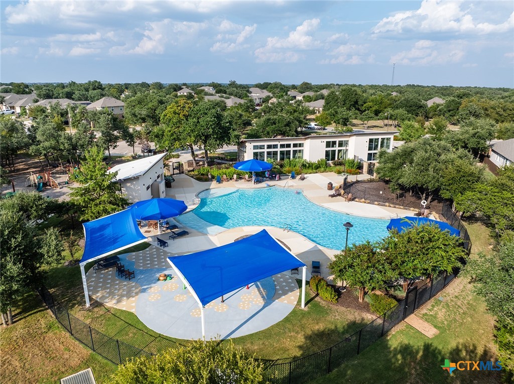 1909 Four Waters Loop Georgetown, TX 78628 - Photo 34 of 35 an aerial view of residential houses with outdoor space and swimming pool