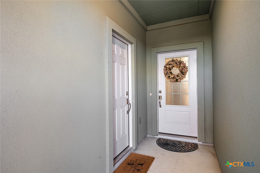 1909 Four Waters Loop Georgetown, TX 78628 - Photo 5 of 35 a view of a room that has a window in it