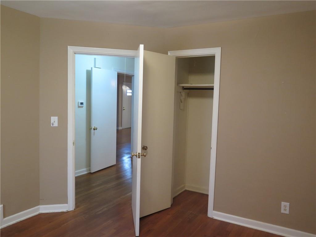 353 Mountain View Drive Northwest Gainesville, GA 30501 - Photo 4 of 8 a view of a hallway with wooden floor