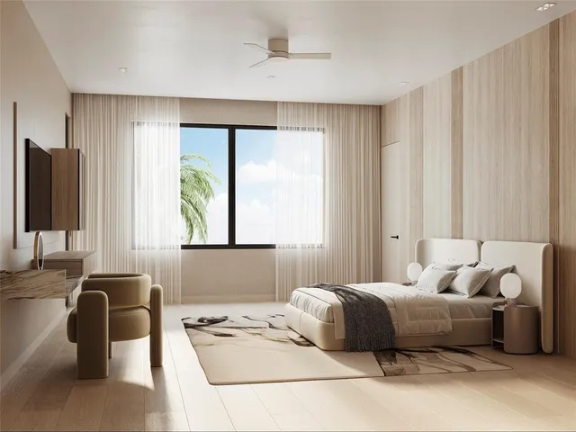 a bedroom with a bed and a couch