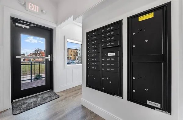 a kitchen with granite countertop a stove and a sink