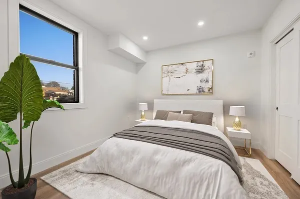 a view of staircase with white walls