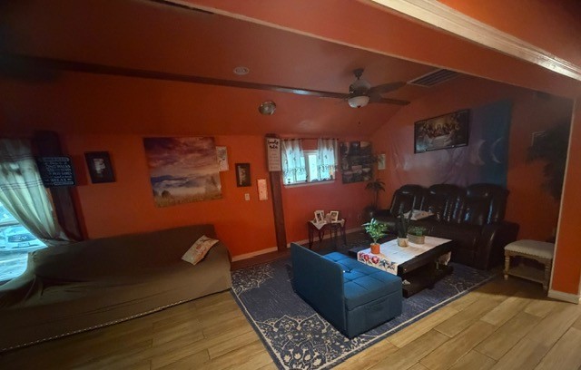 19040 Nottingham Street New Caney, TX 77357 - Photo 2 of 7 a living room with furniture and wooden floor