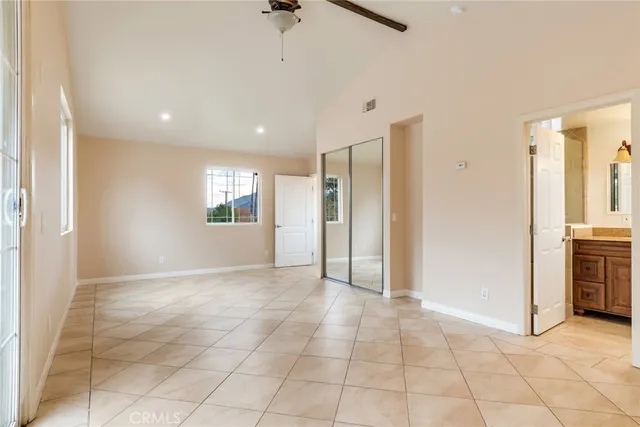 a bathroom with a sink a vanity a mirror and a shower