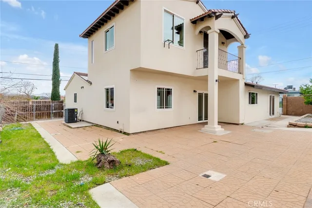 a view of a backyard of a house