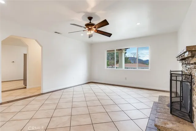 a view of an empty room and window
