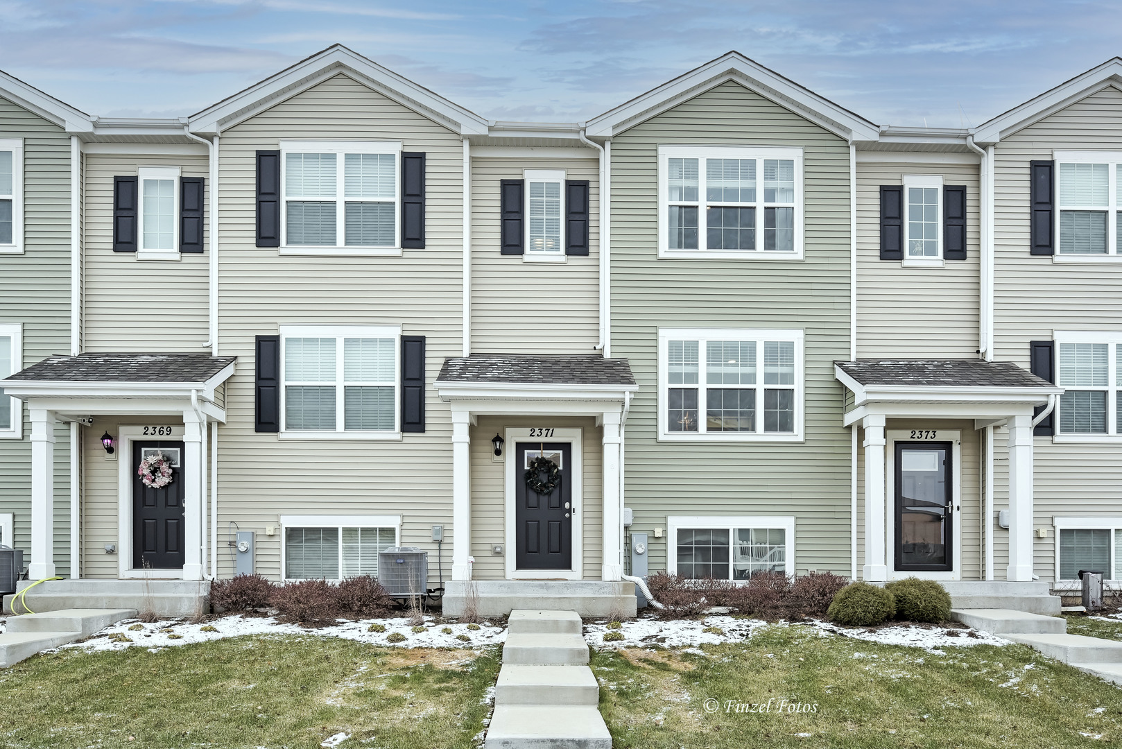 2371 Upland Road Pingree Grove, IL 60140 - Photo 1 of 15 a front view of a house with garden