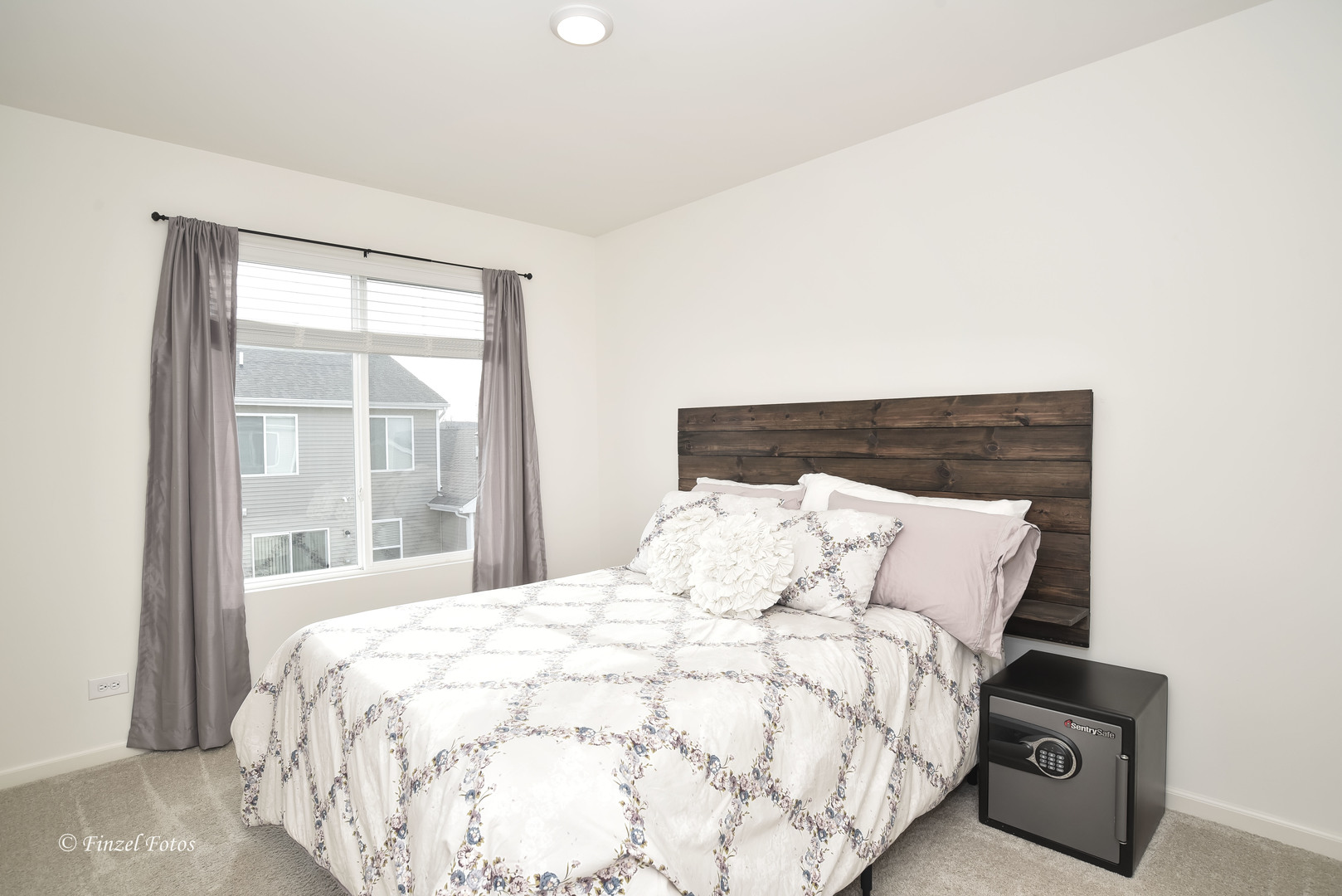2371 Upland Road Pingree Grove, IL 60140 - Photo 11 of 15 a large bed sitting in a bedroom next to a window