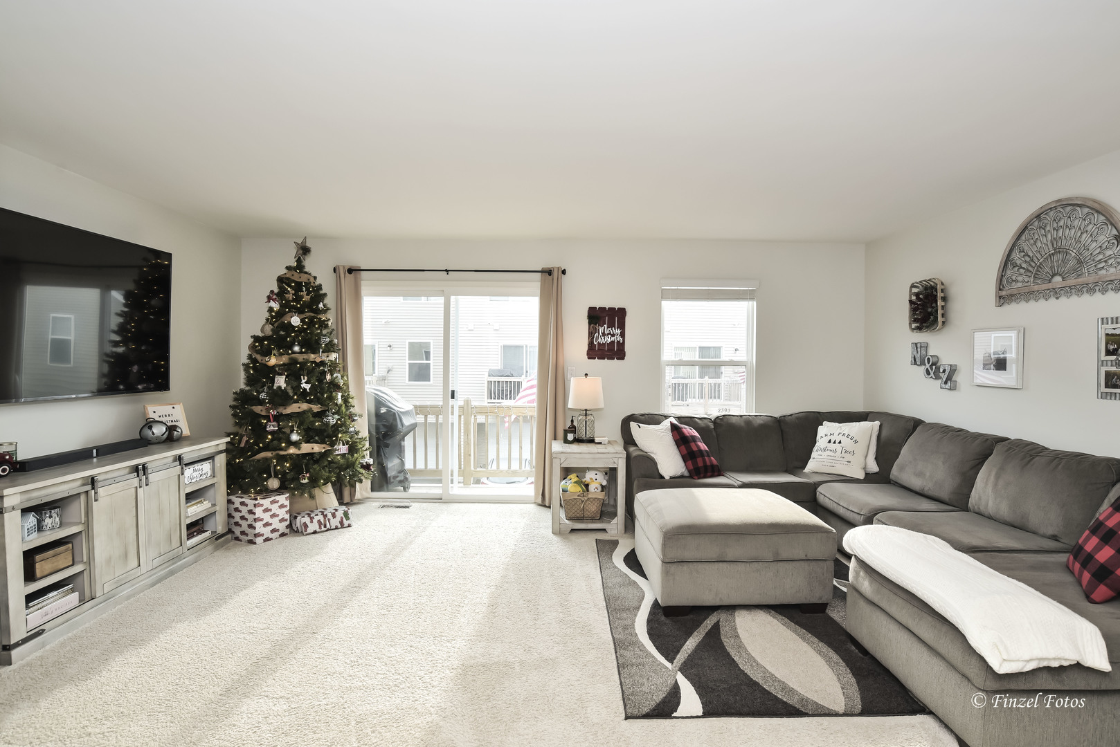 2371 Upland Road Pingree Grove, IL 60140 - Photo 2 of 15 a living room with furniture and a flat screen tv