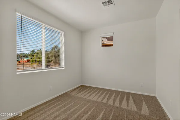 wooden floor and closet in a room