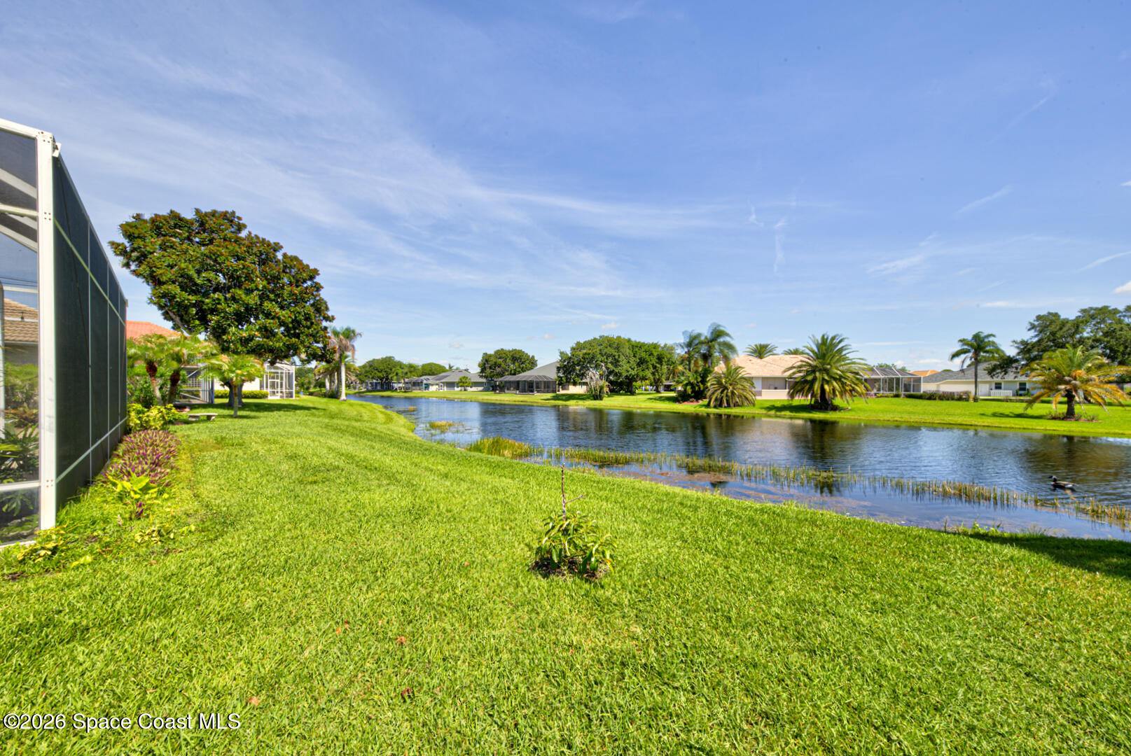 4070 Stoney Point Road Melbourne, FL 32940 - Photo 63 of 78 backyard on lake