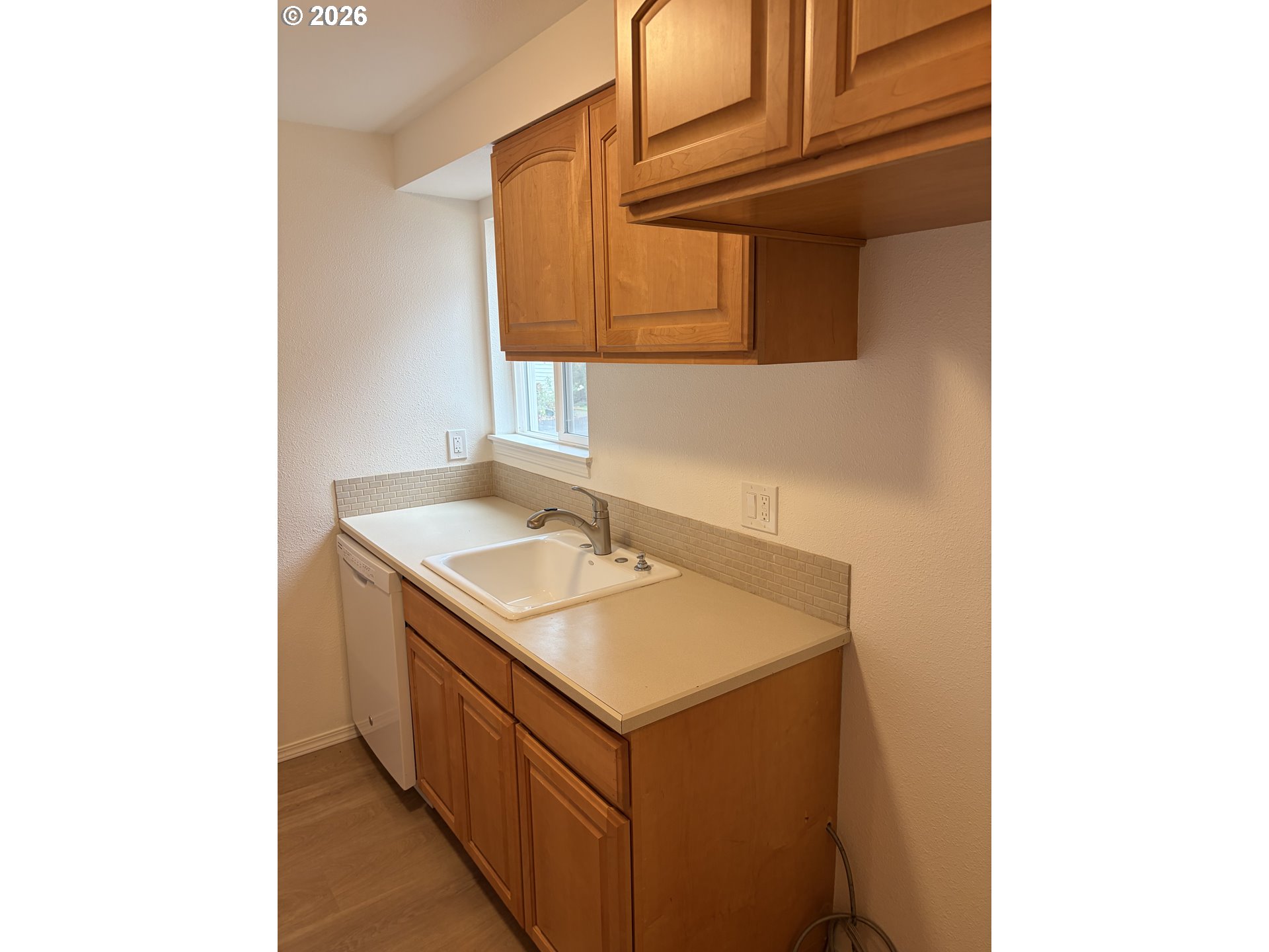732 Southeast Rene Avenue Gresham, OR 97080 - Photo 2 of 21 a utility room with a sink and a mirror