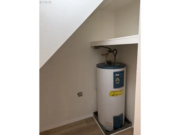 a bathroom with a sink toilet and mirror