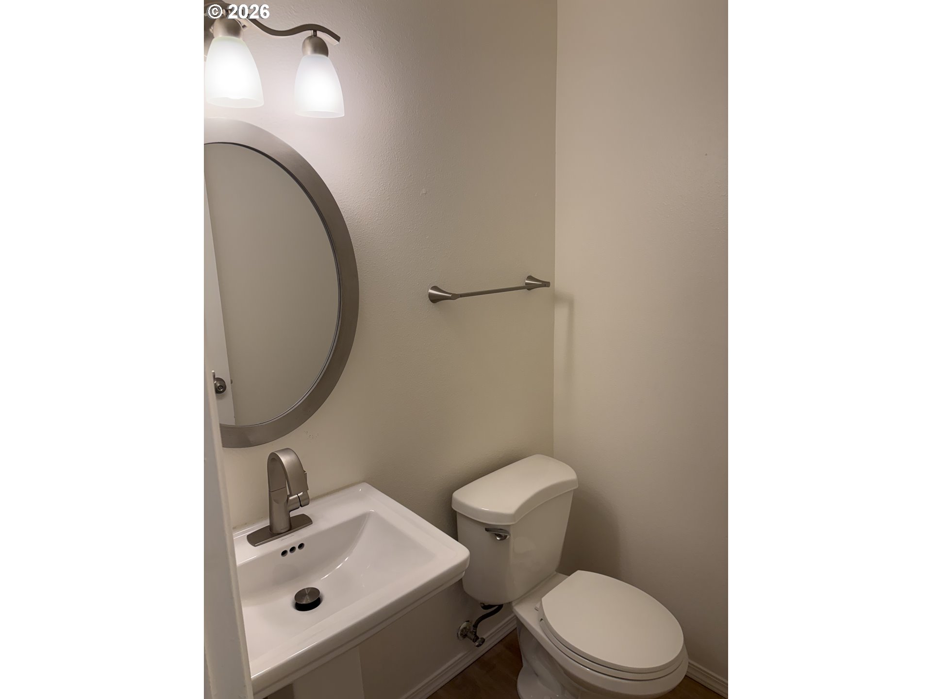 732 Southeast Rene Avenue Gresham, OR 97080 - Photo 7 of 21 a bathroom with a sink toilet and mirror