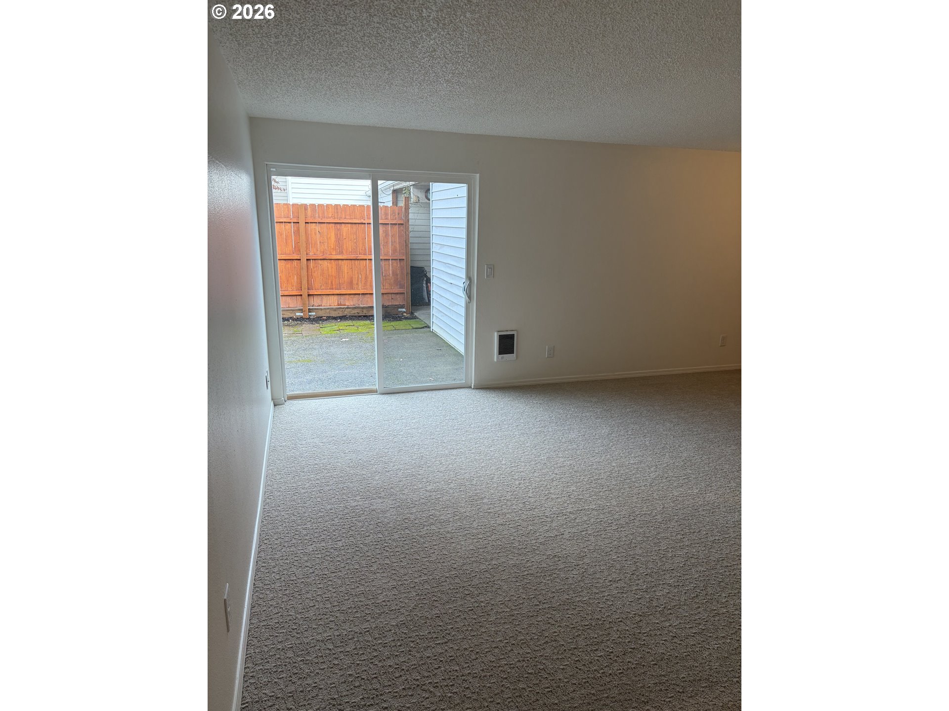 732 Southeast Rene Avenue Gresham, OR 97080 - Photo 8 of 21 a view of empty room with floor to ceiling window