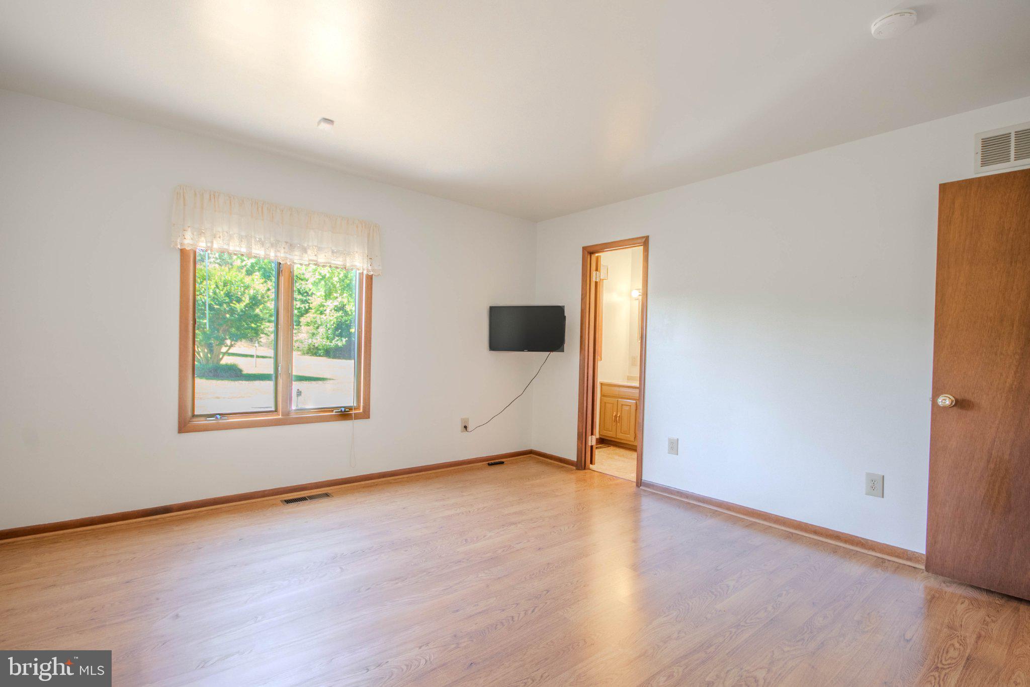31749 Morris Leonard Road Parsonsburg, MD 21849 - Photo 13 of 40 Bright and airy living space awaits.