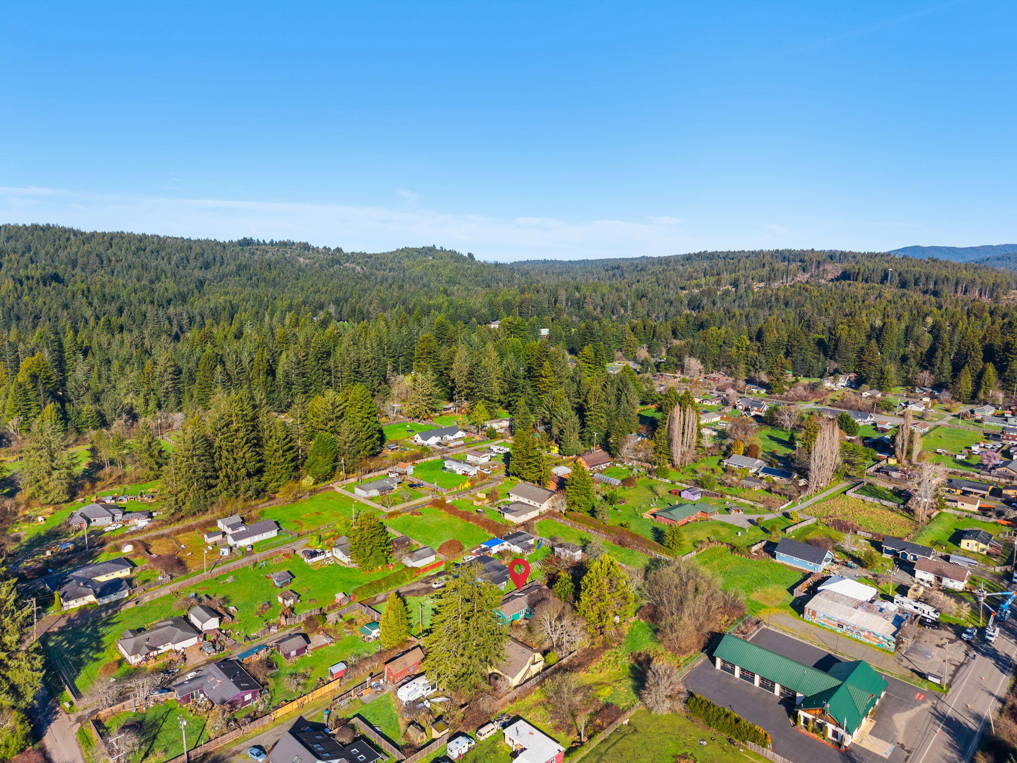 61 Kingston Road Fieldbrook, CA 95519 - Photo 4 of 48 a view of a city with lush green forest